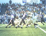 WSU Warrior Football Action Photograph 1999 - Homecoming by Winona State University