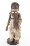 Zuni Chakwaina katsina sculpture with horsehair beard, leather garment and beaded sash. ca. 1920s, 9 1/2" tall