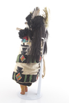 Zuni Shalako katsina sculpture. date unknown, made of pine with elaborate cloth costume and beaded necklace. Includes wool yarn, horsehair and muslin