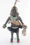 Zuni Shulawitsi, the Little Fire God katsina sculpture. ca. 1930s, 8 3/4" tall. With yarn kilt, deer pelt on chest, dance wands and a turquoise necklace
