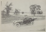 Female students in Old Car on Huff St.