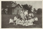 WNS Female Students Early Wood Frame house in background